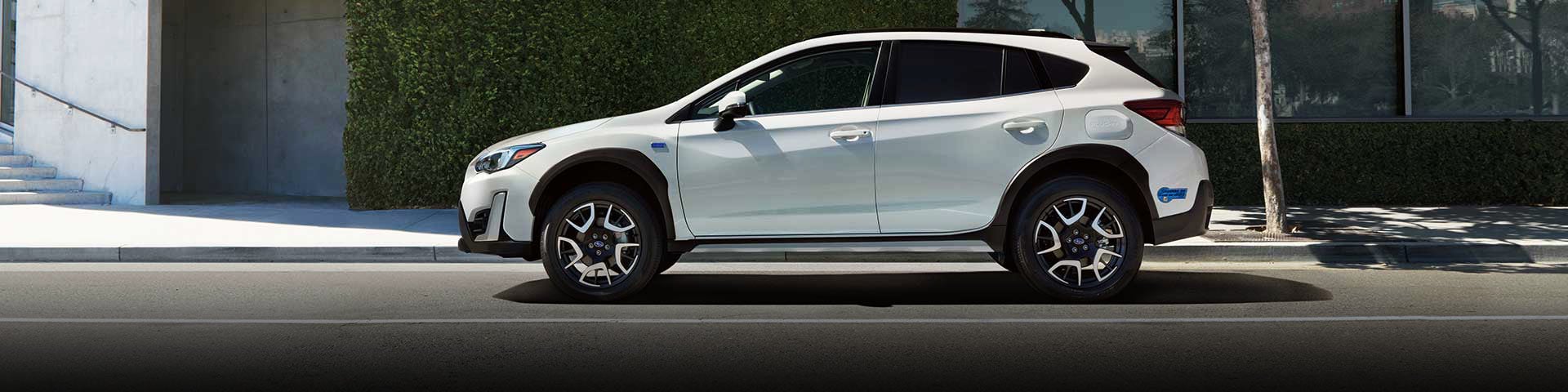The side profile of a white Subaru Crosstrek Hybrid | Vann York Subaru in Asheboro NC