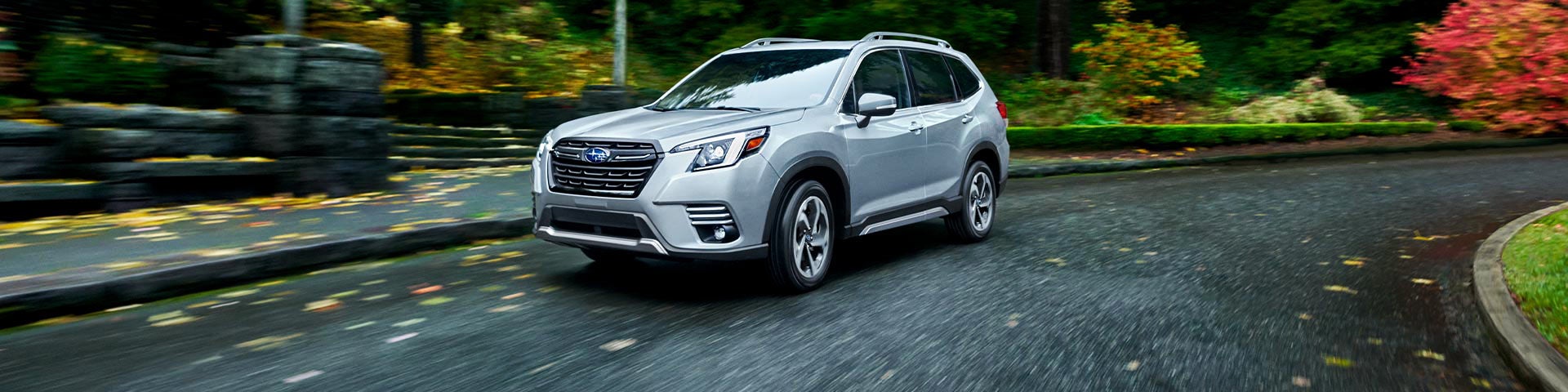 A 2022 Forester driving on a highway. | Vann York Subaru in Asheboro NC