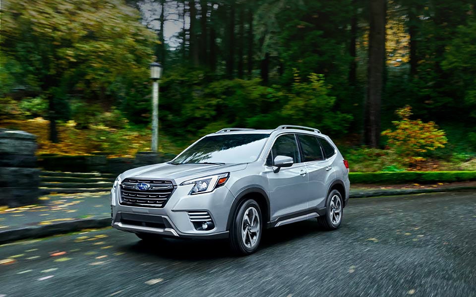 A 2022 Forester driving on a highway. | Vann York Subaru in Asheboro NC